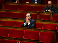 Francois Hollande, deputy of the Socialistes et Apparentes group, is seen during the session of examination of the report of the 2024 end-of...