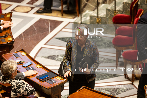 Elisabeth Borne, deputy of the Ensemble pour la Republique group, is seen during the session of examination of the report of the 2024 end-of...