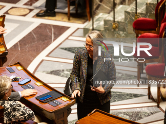 Elisabeth Borne, deputy of the Ensemble pour la Republique group, is seen during the session of examination of the report of the 2024 end-of...