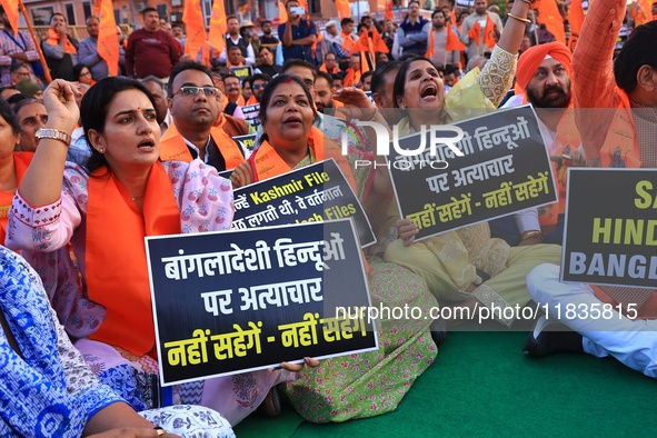 Members of the 'Sarv Hindu Samaj' protest against the arrest of Hindu monk Chinmoy Krishna Das in Bangladesh and the alleged atrocities on H...