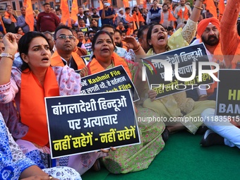 Members of the 'Sarv Hindu Samaj' protest against the arrest of Hindu monk Chinmoy Krishna Das in Bangladesh and the alleged atrocities on H...