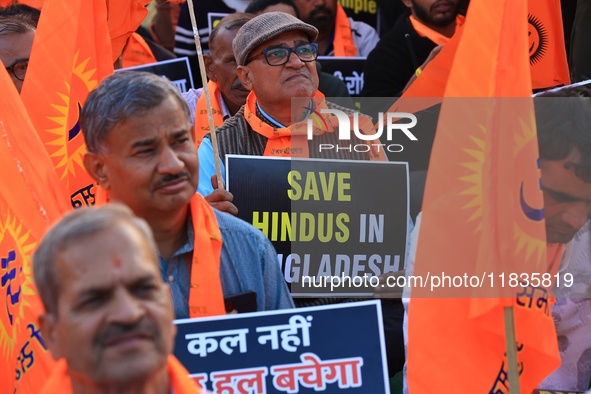 Members of the 'Sarv Hindu Samaj' protest against the arrest of Hindu monk Chinmoy Krishna Das in Bangladesh and the alleged atrocities on H...