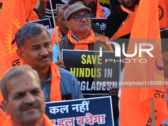 Members of the 'Sarv Hindu Samaj' protest against the arrest of Hindu monk Chinmoy Krishna Das in Bangladesh and the alleged atrocities on H...