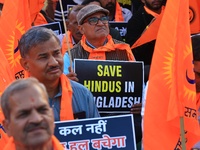 Members of the 'Sarv Hindu Samaj' protest against the arrest of Hindu monk Chinmoy Krishna Das in Bangladesh and the alleged atrocities on H...