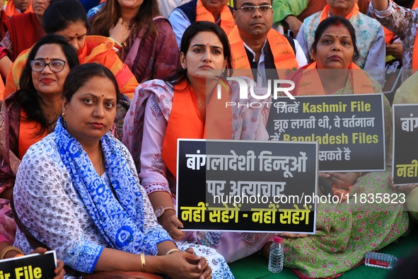 Members of the 'Sarv Hindu Samaj' protest against the arrest of Hindu monk Chinmoy Krishna Das in Bangladesh and the alleged atrocities on H...