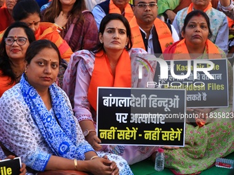 Members of the 'Sarv Hindu Samaj' protest against the arrest of Hindu monk Chinmoy Krishna Das in Bangladesh and the alleged atrocities on H...