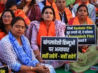 Members of the 'Sarv Hindu Samaj' protest against the arrest of Hindu monk Chinmoy Krishna Das in Bangladesh and the alleged atrocities on H...