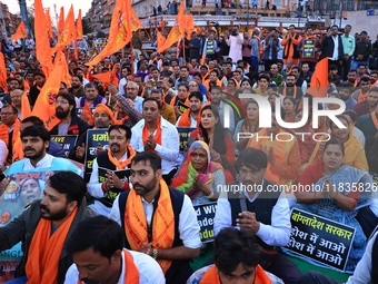 Members of the 'Sarv Hindu Samaj' protest against the arrest of Hindu monk Chinmoy Krishna Das in Bangladesh and the alleged atrocities on H...