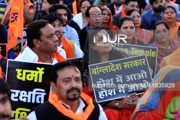 Members of the 'Sarv Hindu Samaj' protest against the arrest of Hindu monk Chinmoy Krishna Das in Bangladesh and the alleged atrocities on H...