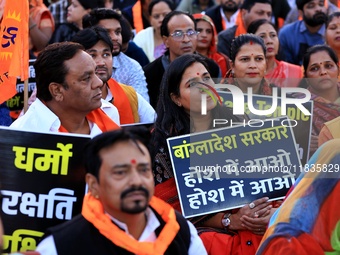 Members of the 'Sarv Hindu Samaj' protest against the arrest of Hindu monk Chinmoy Krishna Das in Bangladesh and the alleged atrocities on H...