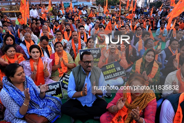 Members of the 'Sarv Hindu Samaj' protest against the arrest of Hindu monk Chinmoy Krishna Das in Bangladesh and the alleged atrocities on H...