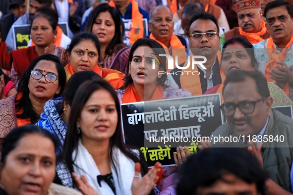 Members of the 'Sarv Hindu Samaj' protest against the arrest of Hindu monk Chinmoy Krishna Das in Bangladesh and the alleged atrocities on H...