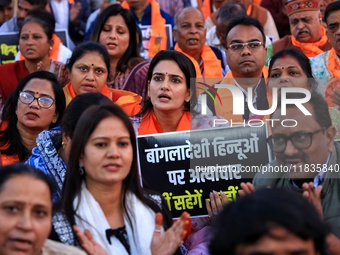 Members of the 'Sarv Hindu Samaj' protest against the arrest of Hindu monk Chinmoy Krishna Das in Bangladesh and the alleged atrocities on H...