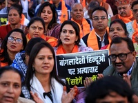 Members of the 'Sarv Hindu Samaj' protest against the arrest of Hindu monk Chinmoy Krishna Das in Bangladesh and the alleged atrocities on H...