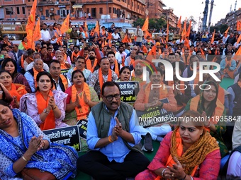 Members of the 'Sarv Hindu Samaj' protest against the arrest of Hindu monk Chinmoy Krishna Das in Bangladesh and the alleged atrocities on H...