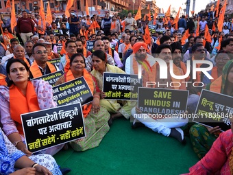 Members of the 'Sarv Hindu Samaj' protest against the arrest of Hindu monk Chinmoy Krishna Das in Bangladesh and the alleged atrocities on H...