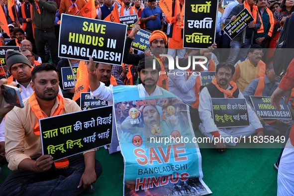 Members of the 'Sarv Hindu Samaj' protest against the arrest of Hindu monk Chinmoy Krishna Das in Bangladesh and the alleged atrocities on H...