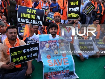 Members of the 'Sarv Hindu Samaj' protest against the arrest of Hindu monk Chinmoy Krishna Das in Bangladesh and the alleged atrocities on H...