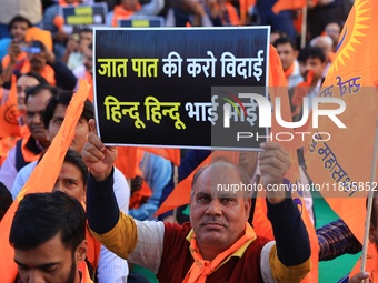 Members of the 'Sarv Hindu Samaj' protest against the arrest of Hindu monk Chinmoy Krishna Das in Bangladesh and the alleged atrocities on H...