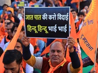 Members of the 'Sarv Hindu Samaj' protest against the arrest of Hindu monk Chinmoy Krishna Das in Bangladesh and the alleged atrocities on H...