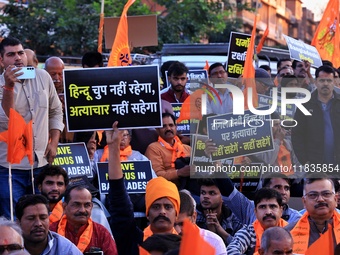 Members of the 'Sarv Hindu Samaj' protest against the arrest of Hindu monk Chinmoy Krishna Das in Bangladesh and the alleged atrocities on H...