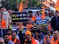 Members of the 'Sarv Hindu Samaj' protest against the arrest of Hindu monk Chinmoy Krishna Das in Bangladesh and the alleged atrocities on H...