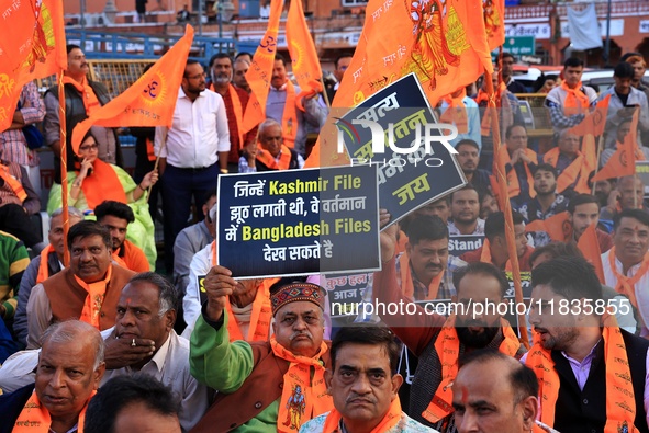 Members of the 'Sarv Hindu Samaj' protest against the arrest of Hindu monk Chinmoy Krishna Das in Bangladesh and the alleged atrocities on H...