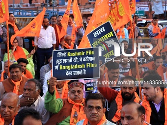 Members of the 'Sarv Hindu Samaj' protest against the arrest of Hindu monk Chinmoy Krishna Das in Bangladesh and the alleged atrocities on H...