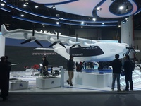 Visitors watch the world's first ton super hybrid cargo drone ''Tianmushan III'' at the Zhejiang International Intelligent Transportation In...