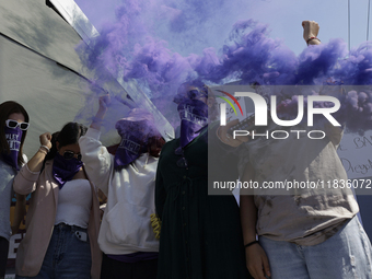 Victims of sexual and digital violence with artificial intelligence demonstrate outside the Reclusorio Oriente in Mexico City, Mexico, on De...