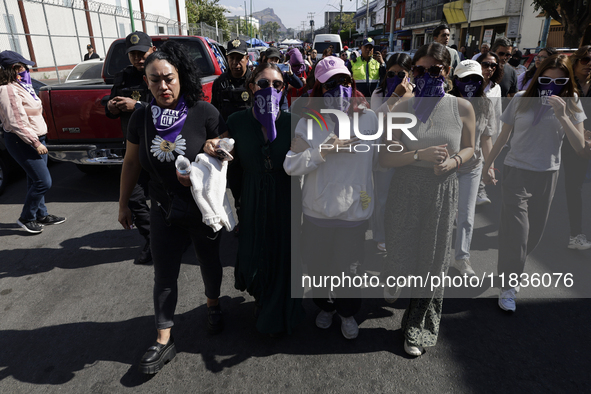 Victims of sexual and digital violence with artificial intelligence demonstrate outside the Reclusorio Oriente in Mexico City, Mexico, on De...