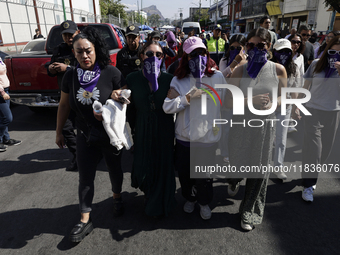 Victims of sexual and digital violence with artificial intelligence demonstrate outside the Reclusorio Oriente in Mexico City, Mexico, on De...