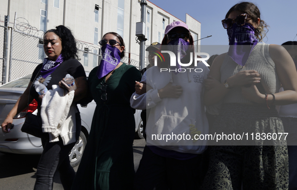 Victims of sexual and digital violence with artificial intelligence demonstrate outside the Reclusorio Oriente in Mexico City, Mexico, on De...