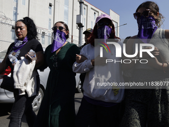 Victims of sexual and digital violence with artificial intelligence demonstrate outside the Reclusorio Oriente in Mexico City, Mexico, on De...