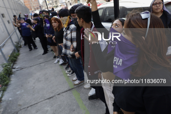 Feminist collectives outside the Reclusorio Oriente in Mexico City, Mexico, on December 4, 2024, accompany victims of sexual and digital vio...