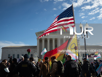 Competing demonstrations take place outside the Supreme Court as it hears a case on gender-affirming care for transgender children in Washin...