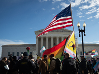 Competing demonstrations take place outside the Supreme Court as it hears a case on gender-affirming care for transgender children in Washin...