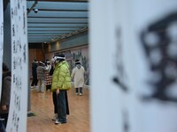 Visitors wear MR Glasses during an immersive interactive exhibition at the Capital Museum in Beijing, China, on December 5, 2024. (