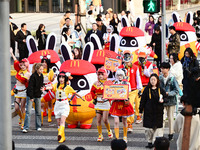 Products from the collaboration between the game Zenless Zone Zero and McDonald's parade through the streets in Shanghai, China, on December...