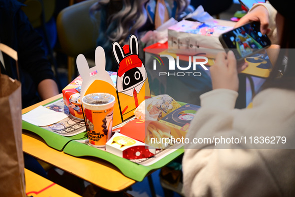 A view of the products from the collaboration between the game Zenless Zone Zero and McDonald's in Shanghai, China, on December 5, 2024. 