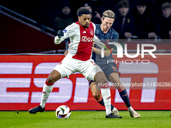 AFC Ajax Amsterdam forward Chuba Akpom and FC Utrecht defender Niklas Vesterlund play during the match between Ajax and Utrecht at the Johan...