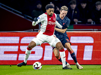 AFC Ajax Amsterdam forward Chuba Akpom and FC Utrecht defender Niklas Vesterlund play during the match between Ajax and Utrecht at the Johan...