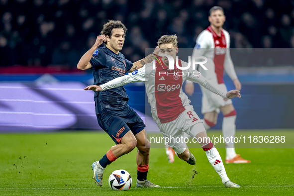 FC Utrecht forward Miguel Rodriguez and AFC Ajax Amsterdam midfielder Kenneth Taylor participate in the match between Ajax and Utrecht at th...