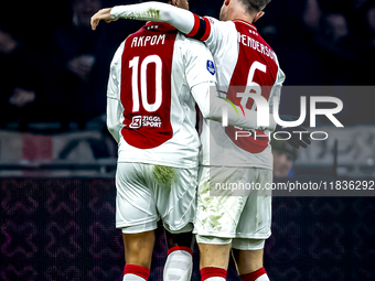 AFC Ajax Amsterdam forward Chuba Akpom and AFC Ajax Amsterdam midfielder Jordan Henderson participate in the match between Ajax and Utrecht...