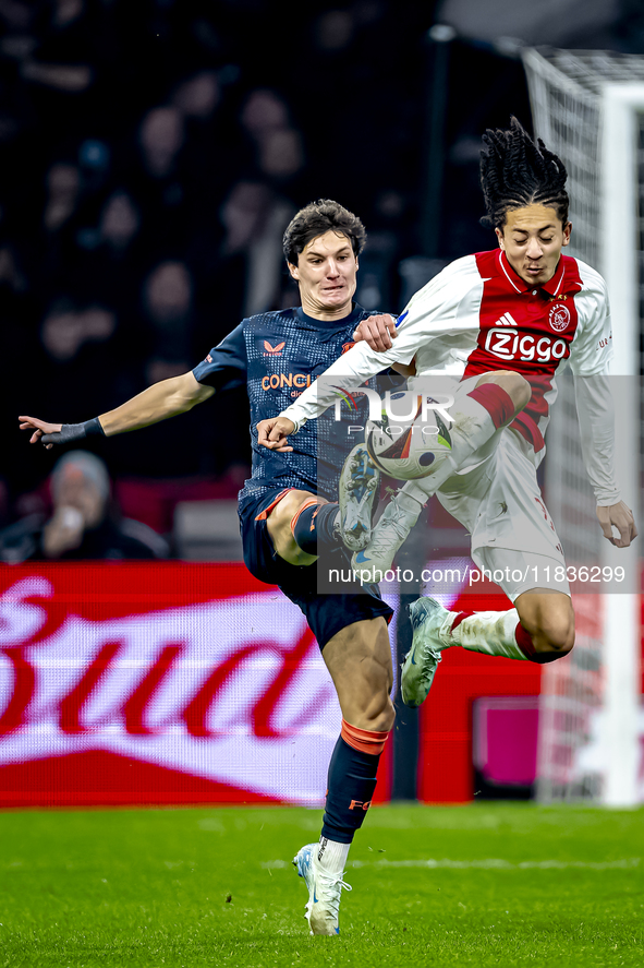 FC Utrecht midfielder Paxten Aaronson and AFC Ajax Amsterdam midfielder Kian Fitz-Jim play during the match between Ajax and Utrecht at the...