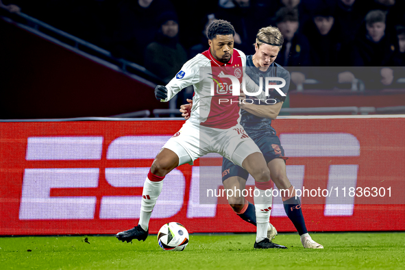 AFC Ajax Amsterdam forward Chuba Akpom and FC Utrecht defender Niklas Vesterlund play during the match between Ajax and Utrecht at the Johan...