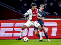 AFC Ajax Amsterdam forward Chuba Akpom and FC Utrecht defender Niklas Vesterlund play during the match between Ajax and Utrecht at the Johan...