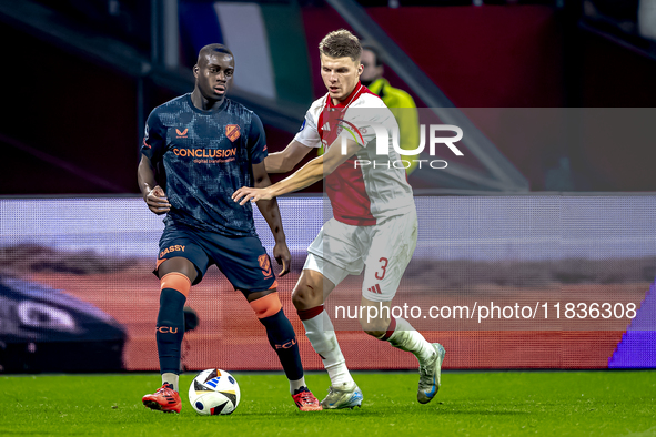 FC Utrecht forward Yoann Cathline and AFC Ajax Amsterdam defender Anton Gaaei participate in the match between Ajax and Utrecht at the Johan...