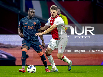 FC Utrecht forward Yoann Cathline and AFC Ajax Amsterdam defender Anton Gaaei participate in the match between Ajax and Utrecht at the Johan...