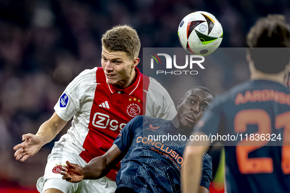 AFC Ajax Amsterdam defender Anton Gaaei and FC Utrecht midfielder Taylor Booth participate in the match between Ajax and Utrecht at the Joha...